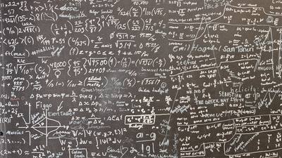 a blackboard with a lot of writing on it