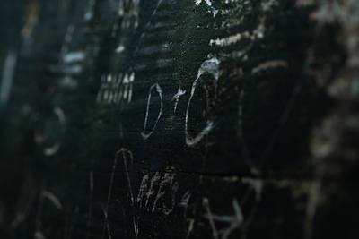 A lovely close up image of a bridge that had been carved into, and weathered
