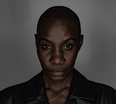 Black woman with a shaved head